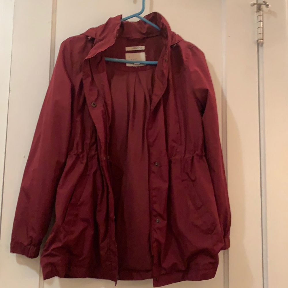 red rain jacket